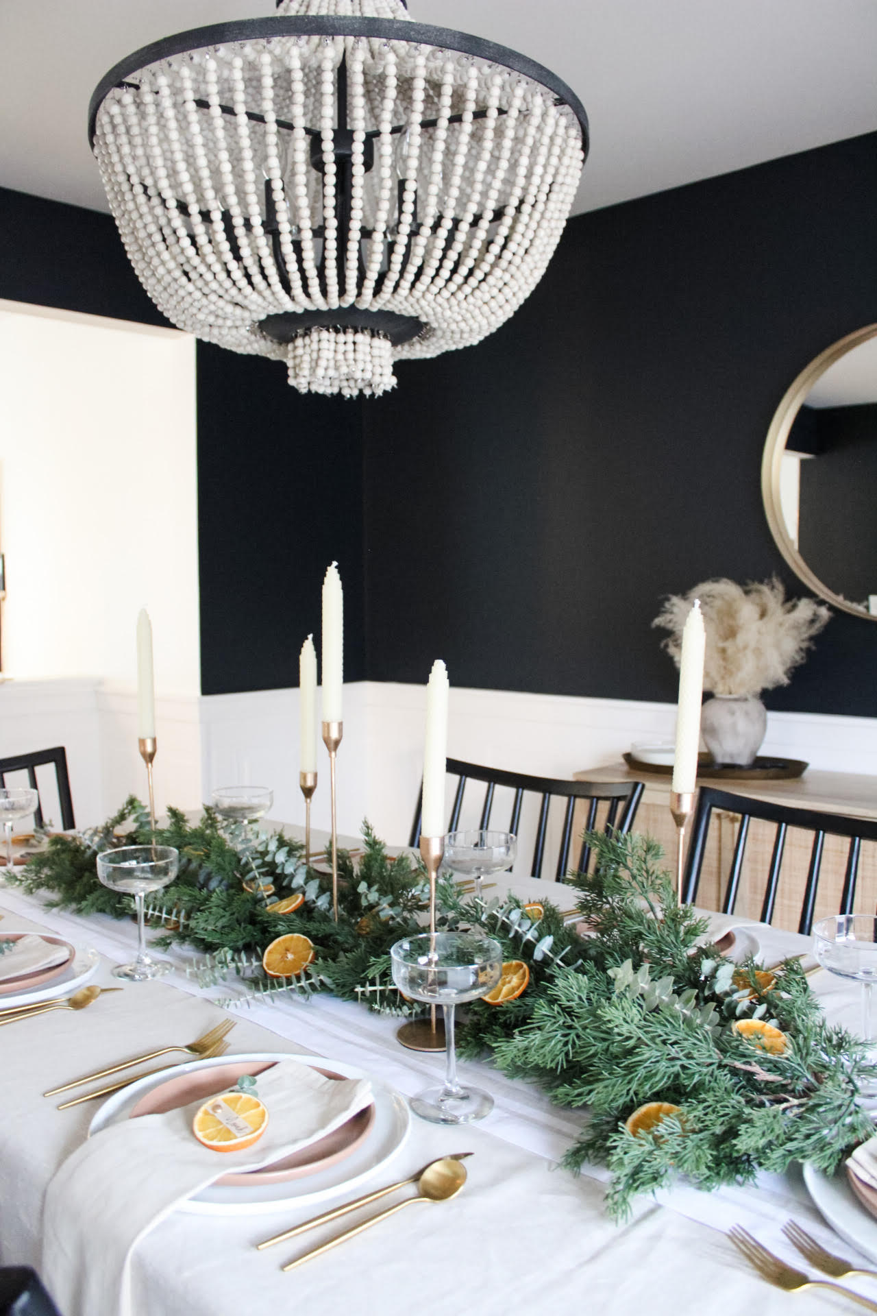 table setting using a faux garland and some eucalyptu to achieve that neutral grenery look for the tablescape