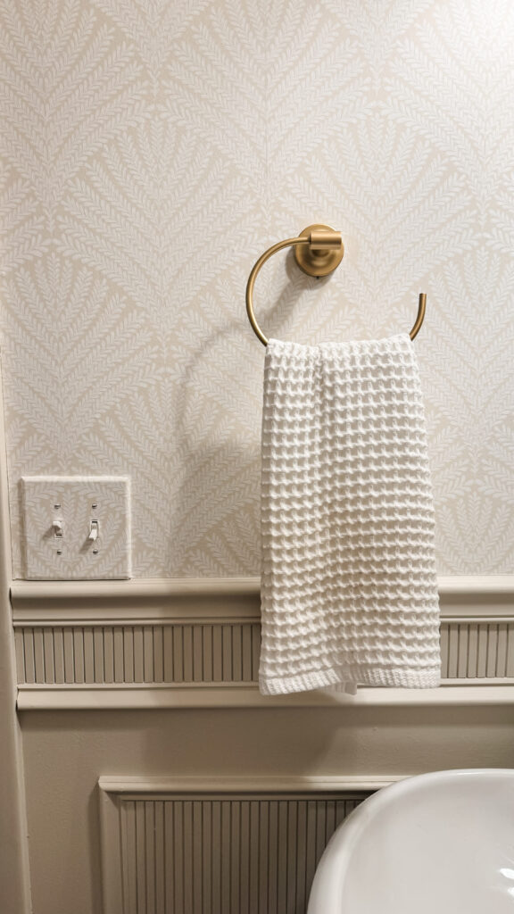 towel holder, wallpaper and wainscoting - the timeless trim